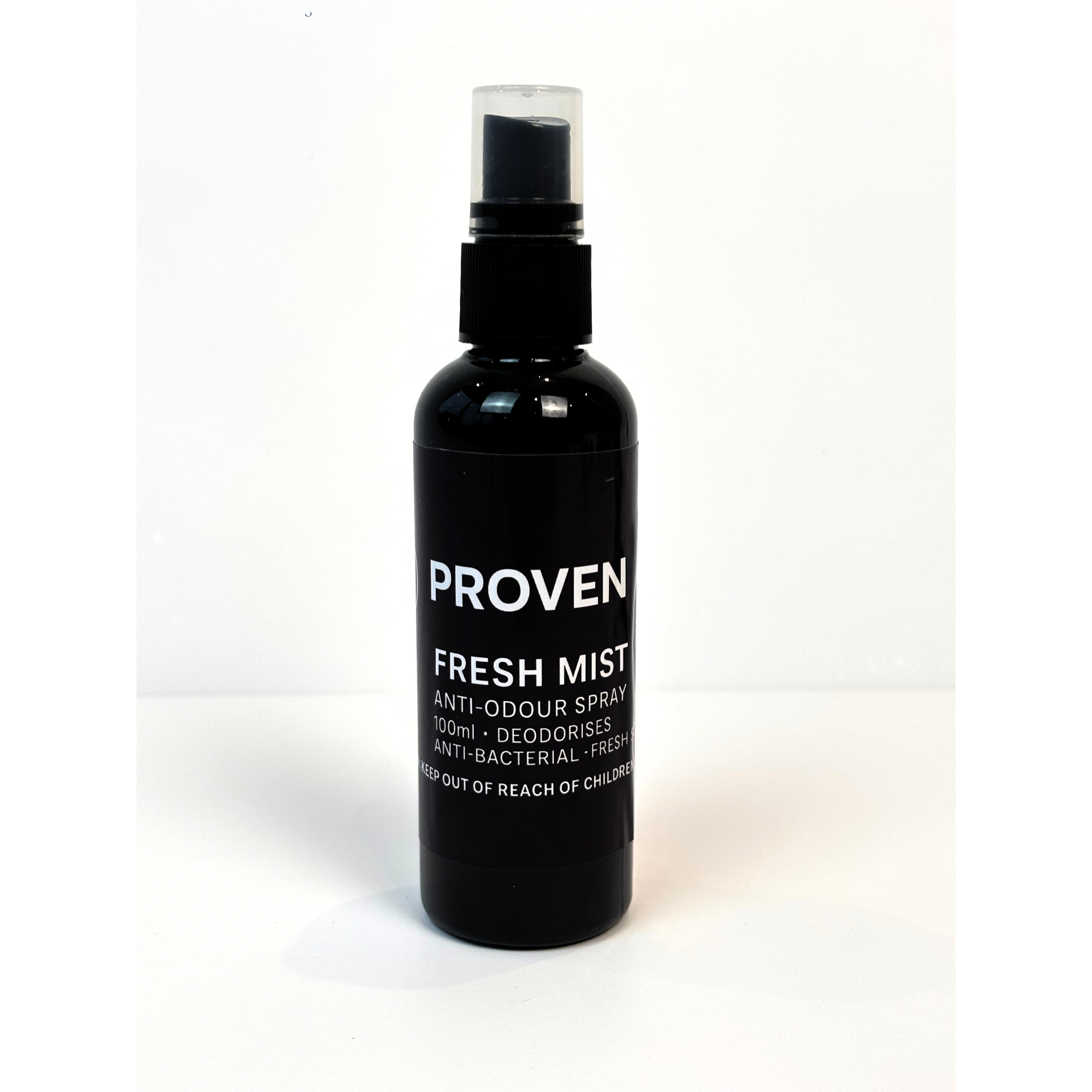 Black spray bottle labeled 'Proven Fresh Mist' on a white background